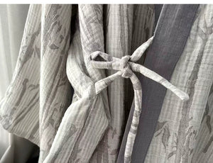 Crossover front edge and softly structured trim on the New Chinese style robe