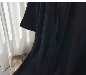 Wide sleeve and cuff construction of the breathable black robe