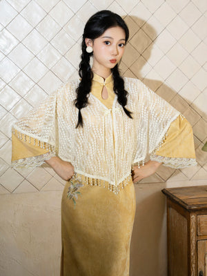 Yellow qipao and ivory fringe shawl