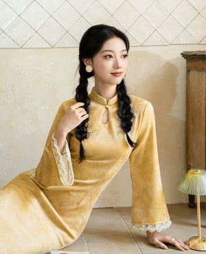 Yellow qipao with white lace slip, seated styling