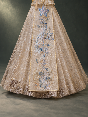 Champagne Xiuhe wedding skirt, blue dragon phoenix motif and decorated hem detail