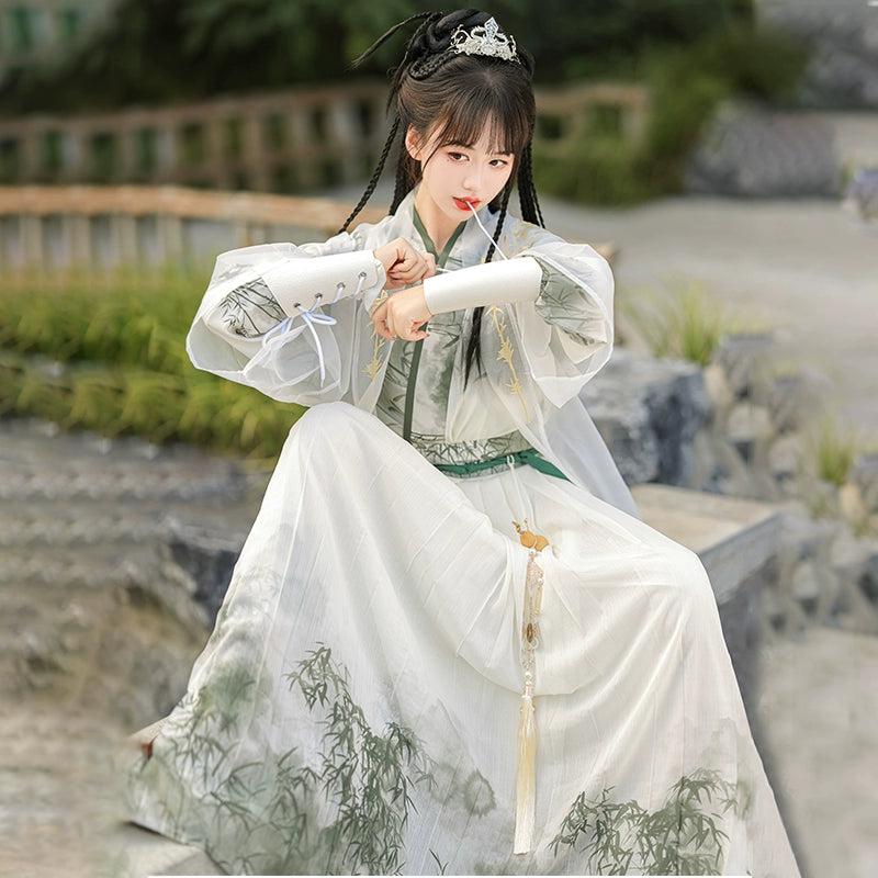 A traditional Chinese hanfu in a beautiful combination of pink and green, designed for women. This elegant dress is perfect for celebrating Chinese festivals like the Lunar New Year, as well as for cultural performances or cosplay events, showcasing classic Chinese fashion with a modern twist.