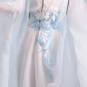 Close-up of the pale blue decorative waist sash