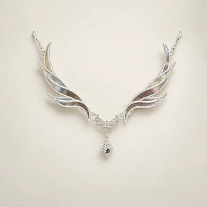 Clear-accent forehead ornament with wing-shaped sides