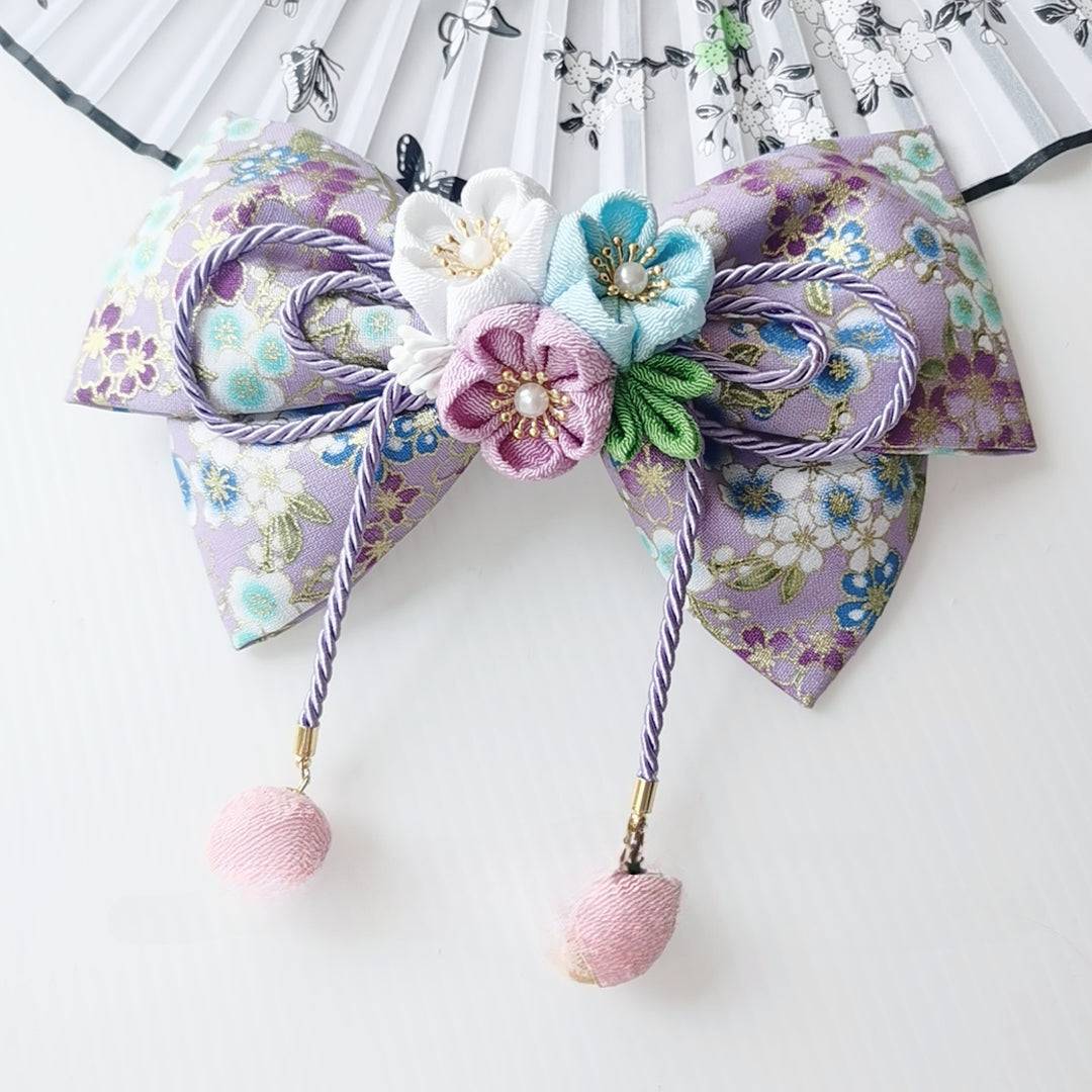 Lavender floral Japanese kimono hair accessory with pastel blossoms and purple tassels, ideal for lolita or cosplay styling.