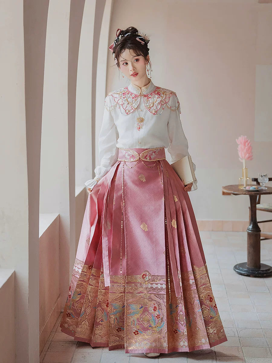 Front view of the pink four-piece Hanfu outfit showing the decorative waist belt and pleated skirt