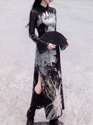 Front view of the black floral qipao styled with a folding fan