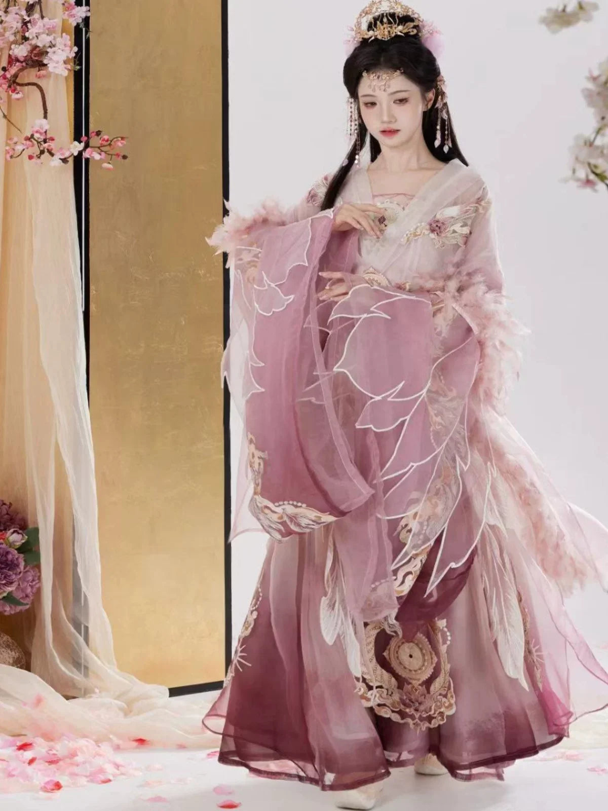 Women's Fu Ling Hanfu outfit showing embroidered wide-sleeve top and elegant waist skirt styling