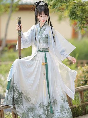 A traditional Chinese hanfu in a beautiful combination of pink and green, designed for women. This elegant dress is perfect for celebrating Chinese festivals like the Lunar New Year, as well as for cultural performances or cosplay events, showcasing classic Chinese fashion with a modern twist.