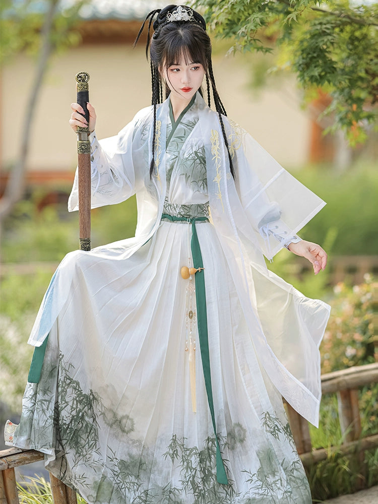 A traditional Chinese hanfu in a beautiful combination of pink and green, designed for women. This elegant dress is perfect for celebrating Chinese festivals like the Lunar New Year, as well as for cultural performances or cosplay events, showcasing classic Chinese fashion with a modern twist.