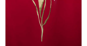 Green iris stem embroidery detail