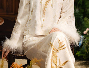 Ivory and gold bridal jacket and skirt fabric detail