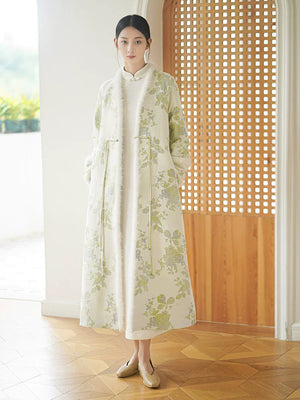 Ivory-Green woven floral wool-blend long coat shown as a polished New Chinese Style coat, highlighting woven floral pattern, wool-blend texture and elegant long-line shape.