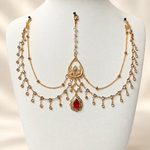 Red forehead chain on a display bust