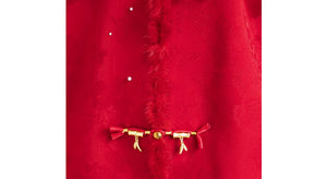 Red floral jacket fabric and gold-tone bar fastening
