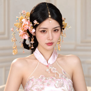 Front portrait of floral bridal hairpins and forehead chain
