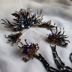 Linglong Ji dark floral crown, side pins and tassel pins arranged together