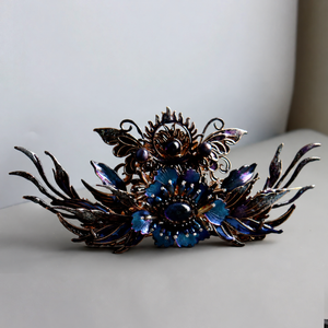 Dark floral hair crown with blue-purple petals and metallic filigree