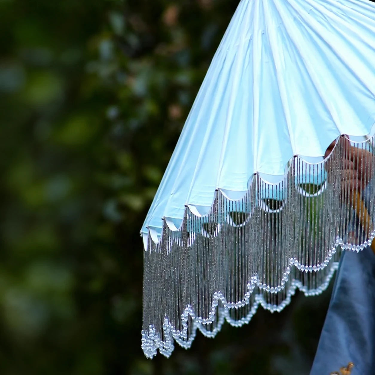 Ice blue oil-paper parasol with long beaded tassels