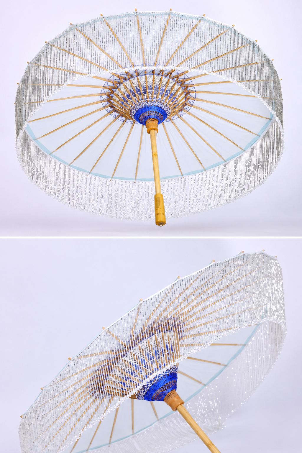 Ice-blue oil-paper parasol shown open from below with bamboo ribs and woven hub details