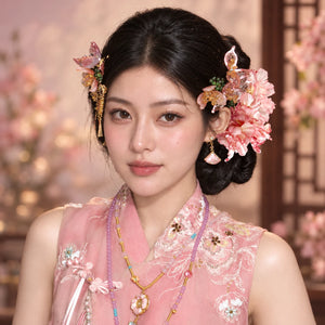 Side portrait showing pink floral bridal ornaments