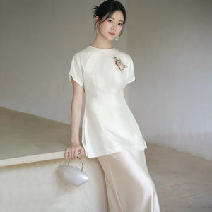 Design view of the Porcelain-Moon mulberry silk top and champagne skirt, highlighting mulberry silk top, champagne skirt and refined Chinese-inspired styling.