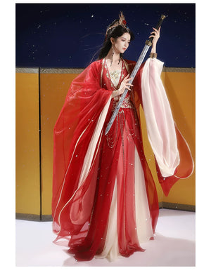 Red and ivory Hanfu outfit with a stage prop