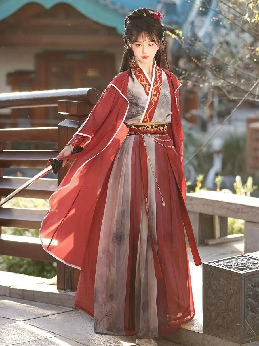Red modern hanfu dress for women, blending traditional Song Dynasty elegance with contemporary style. Crafted from luxurious silk, this hanfu includes an optional matching coat or jacket, making it suitable for winter, casual outings, or formal occasions like graduations. Available at our online hanfu shop, offering a range of authentic hanfu for sale, this piece combines the beauty of classic Chinese clothing with modern fashion elements from top Chinese brands. Perfect for anyone looking for where to buy