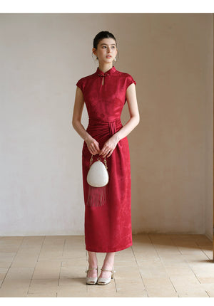 Occasion styling image of the Ruby Red acetate jacquard pleated qipao dress, presented as an elegant modern red qipao dress.
