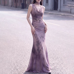 Sleeveless purple bamboo print knit dress shown without the cardigan