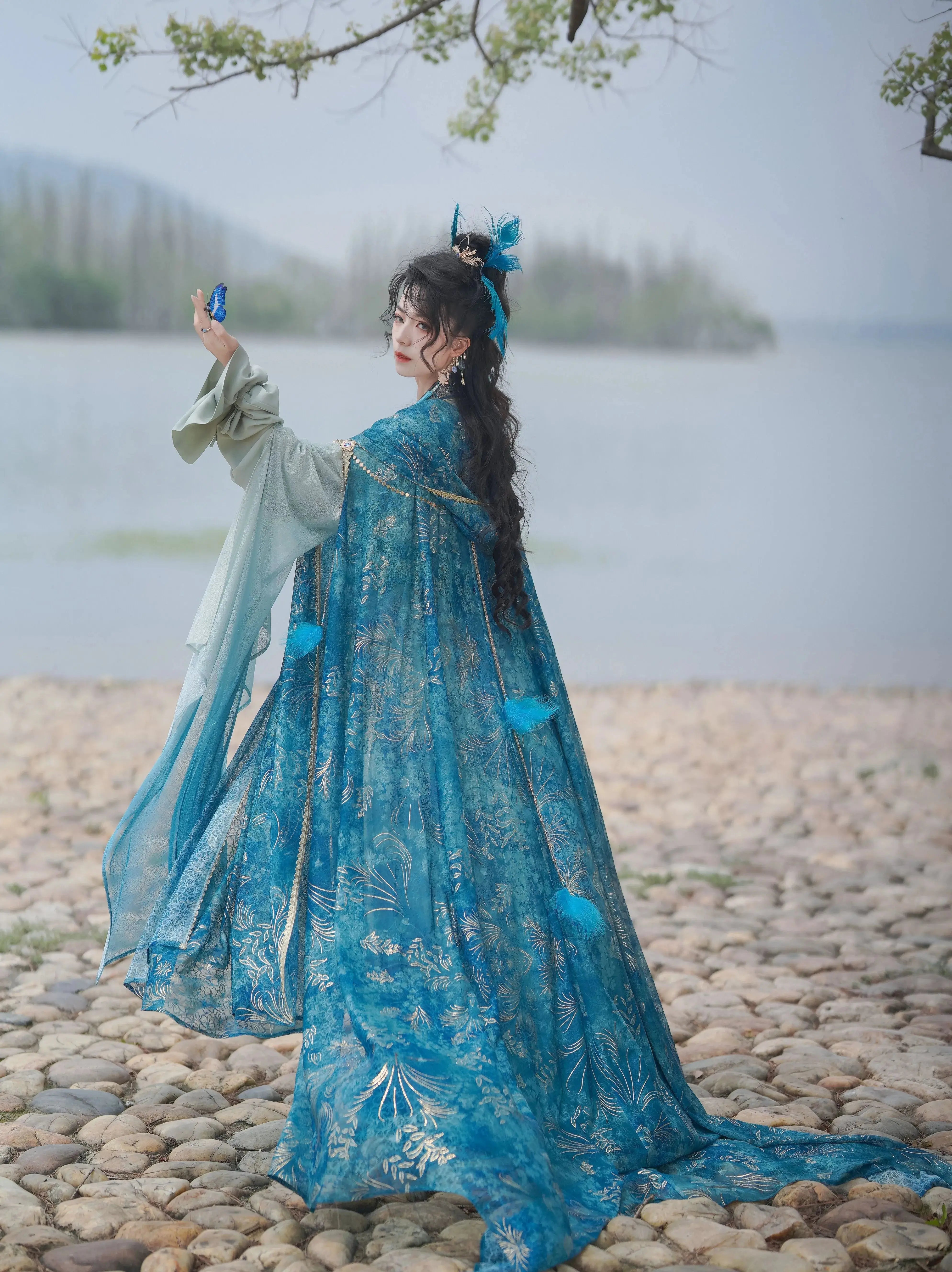 Blue traditional hanfu dress for women, inspired by the Song Dynasty style and crafted from luxurious silk. This hanfu includes a matching coat or jacket, making it perfect for winter and Chinese New Year celebrations. Ideal for occasions like graduations, cosplay events, or even as a fairy-style hanfu, this outfit combines elegance and historical charm. Available at our hanfu shop, where you can explore authentic hanfu for sale. A perfect choice for those wondering where to buy hanfu online, offering both
