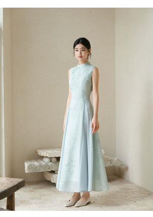 Design view of the Water-Blue jacquard A-line qipao dress, highlighting jacquard texture, Chinese collar and graceful A-line cheongsam silhouette.