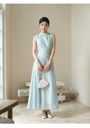 Detailed product image of the Water-Blue jacquard A-line qipao dress, showing fabric texture, finish and craftsmanship.
