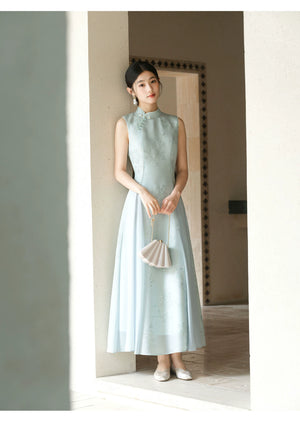 Water-Blue jacquard A-line qipao dress shown as a polished modern blue qipao dress, highlighting jacquard texture, Chinese collar and graceful A-line cheongsam silhouette.