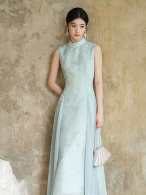 Water-Blue jacquard A-line qipao dress shown as a polished modern blue qipao dress, highlighting jacquard texture, Chinese collar and graceful A-line cheongsam silhouette.