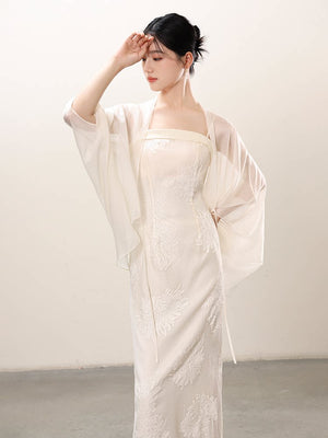 White embroidered slip dress and sheer outer layer shown as a polished white New Chinese Style outfit, highlighting embroidered slip dress, translucent outer layer and soft layered drape.