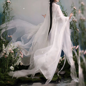 White sheer robe fabric flowing behind the wearer