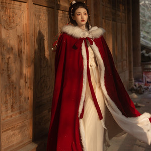 Red Hanfu Cape Featuring a diverse collection of Hanfu styles, this display presents a blend of traditional and modern elements, from the intricate embroidery of classic Hanfu to contemporary menswear. The assortment includes authentic Tang Dynasty dresses and detailed Ming Dynasty Hanfu, alongside luxurious royal attire and scholar officials' outfits. With a special emphasis on men's Hanfu, the exhibit highlights the rich cultural tapestry of traditional Asian clothing and modern, Asian-inspired fashion