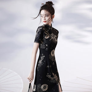 Black | Modern Chinese Qipao 【国潮】A stunning black modern Chinese Qipao dress featuring a form-fitting silhouette and intricate embroidery. The dress also features a side slit, adding a touch of glamour to this already elegant look. Perfect for special events, weddings, or a night out, this dress embodies the fusion of traditional Chinese fashion with modern elements. Shop now to upgrade your wardrobe with this beautiful and timeless piece of modern Chinese fashion.