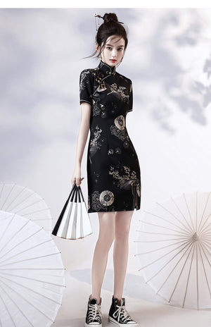 Black | Modern Chinese Qipao 【国潮】A stunning black modern Chinese Qipao dress featuring a form-fitting silhouette and intricate embroidery. The dress also features a side slit, adding a touch of glamour to this already elegant look. Perfect for special events, weddings, or a night out, this dress embodies the fusion of traditional Chinese fashion with modern elements. Shop now to upgrade your wardrobe with this beautiful and timeless piece of modern Chinese fashion.