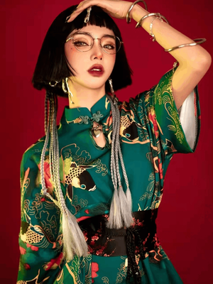 Featuring an elegant display of an array of items including a Green Qipao dress, a modern Qipao shirt and a sexy Cheongsam, this collection presents a blend of traditional and modern styles. The modern Cheongsam dress, along with the Cheongsam modern top, redefines traditional aesthetics with a contemporary twist. Adding an element of allure is the sexy Cheongsam lingerie, complemented by a Cheongsam shirt in comfortable fabric.