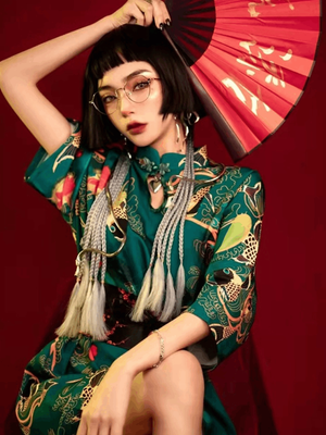 Featuring an elegant display of an array of items including a Green Qipao dress, a modern Qipao shirt and a sexy Cheongsam, this collection presents a blend of traditional and modern styles. The modern Cheongsam dress, along with the Cheongsam modern top, redefines traditional aesthetics with a contemporary twist. Adding an element of allure is the sexy Cheongsam lingerie, complemented by a Cheongsam shirt in comfortable fabric.