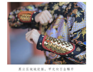 Matching silver dragon-scale forearm guards worn on both arms with Ming-style Hanfu