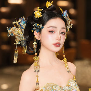 Bridal hairpin lace step in blue and gold with floral and tassel embellishments, styled for Hanfu and cheongsam wedding attire.