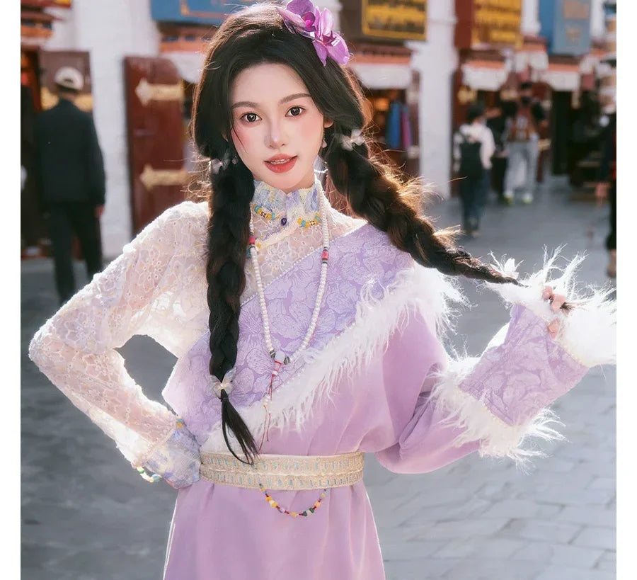 Authentic moonstone pink tibetan style dress inspired travel outfit for scenic portraits and cultural events standing front