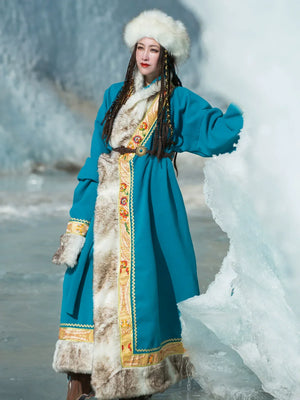 Authentic peacock blue tibetan robe wearable art for a unique modern cultural experience standing front