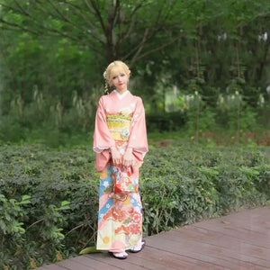 Authentic traditional formal japanese kimono women visiting kimono set travel japanese wedding dress for women standing front


