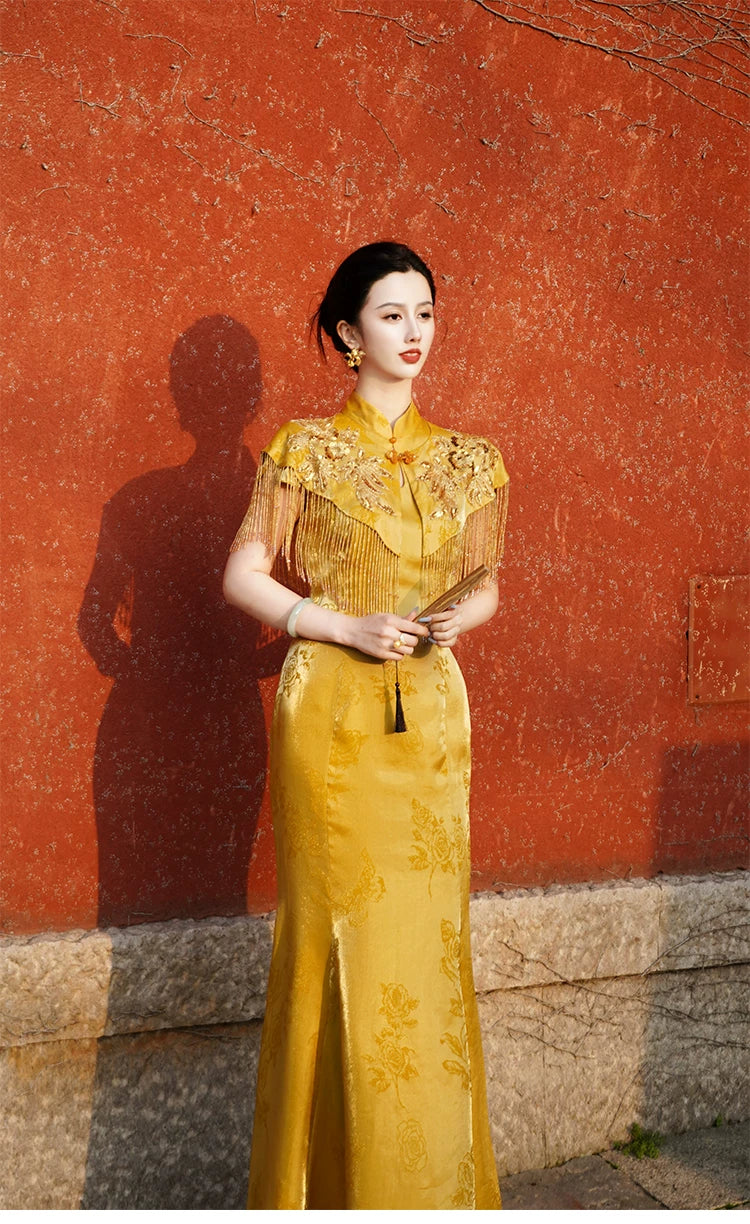 Authentic zhiye jinchan new chinese dress mulberry silk bead embroidered tassel cloud shoulder fishtail cheongsam standing front
