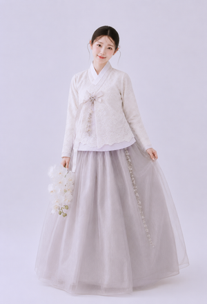 Bridal hanbok with floral lace embroidery soft grey tulle skirt and pearl accents for wedding bride fabric and lace detail