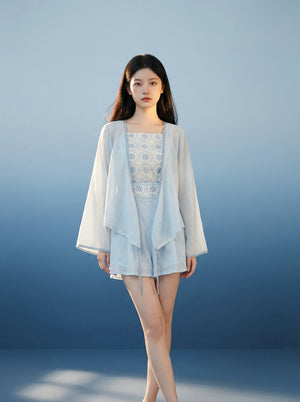  Comfortable xiaolu water suspender commuter set tencel cross neck top and bud shorts with sunscreen long sleeve cover up in blue standing front